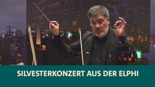 Teaserbild: Elbphilharmonie in der Dämmerung und Dirigent Alain Gilbert mit dem NDR Elbphilharmonieorchester
